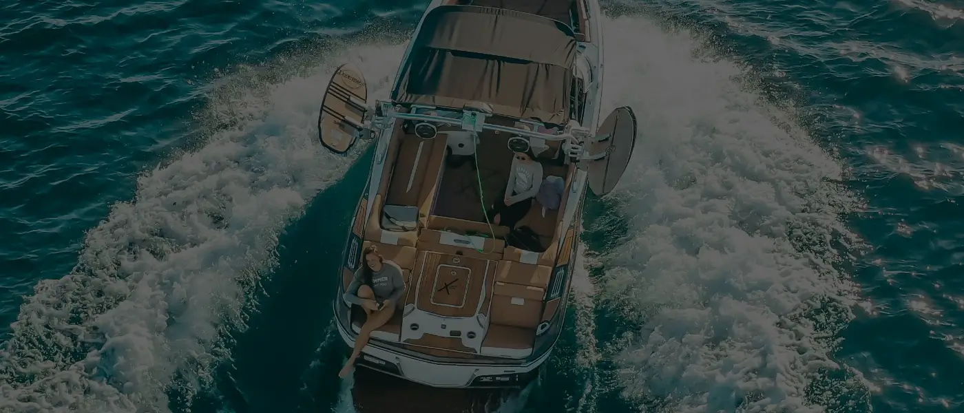 Overhead shot of a boat coasting through the clear water